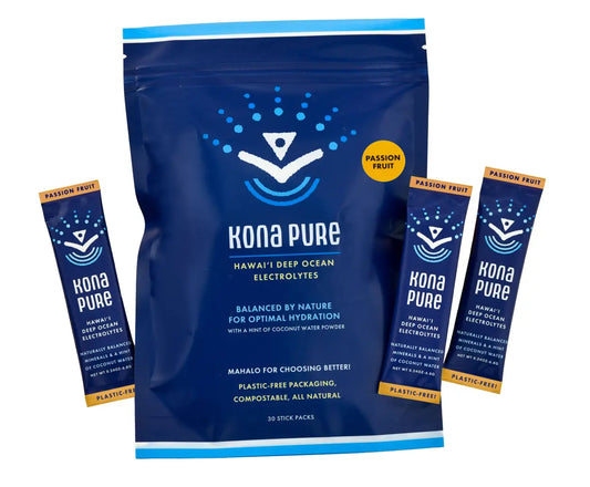 Kona Pure electrolyte powder package with multiple stick packs on a white background